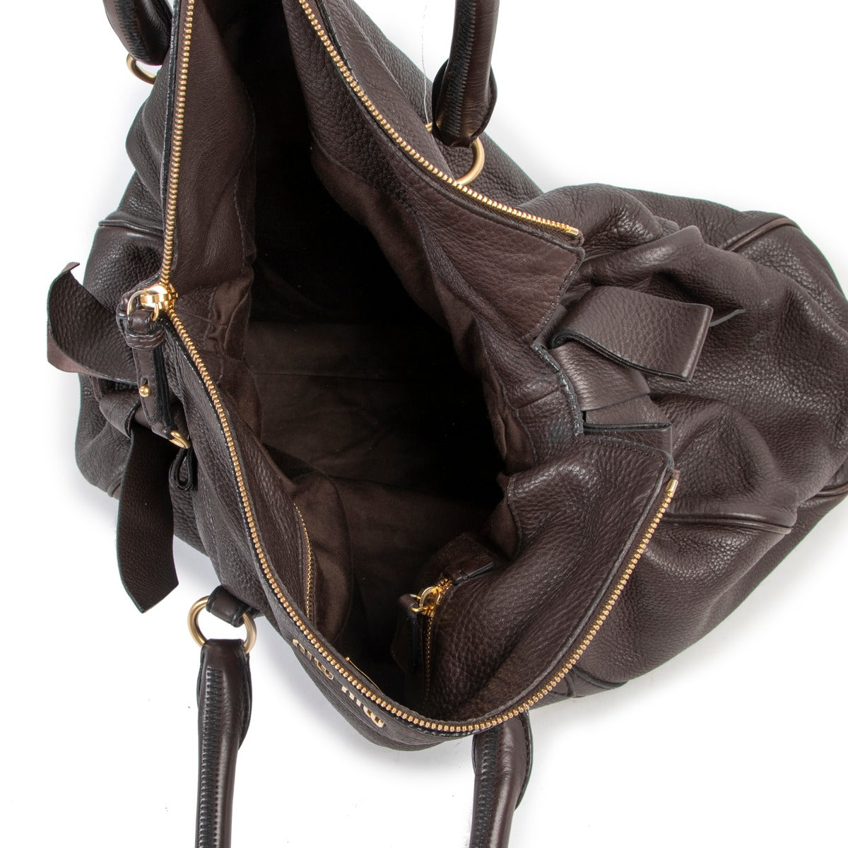 Original Miu Miu Brown Leather Shoulder bag in good condition on Labellov vintage shop in Antwerp with 2nd hand designer goods