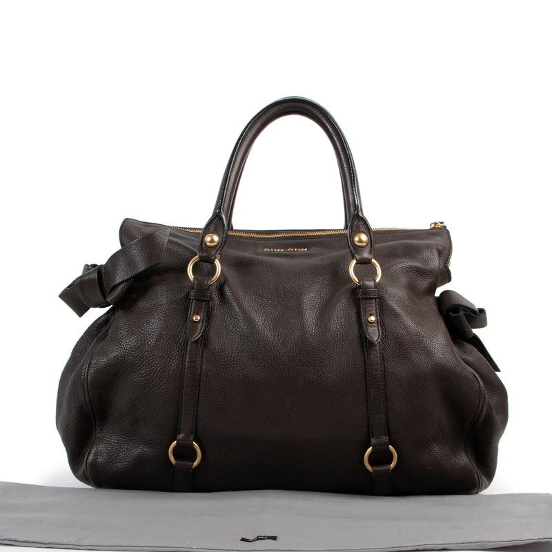 Original Miu Miu Brown Leather Shoulder bag in good condition on Labellov vintage shop in Antwerp with 2nd hand designer goods