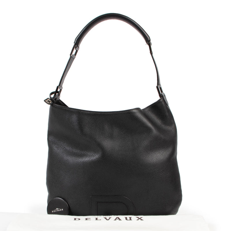 Achetez en ligne un authentique sac à bandoulière Delvaux Le Louise PM en cuir noir au bon prix.