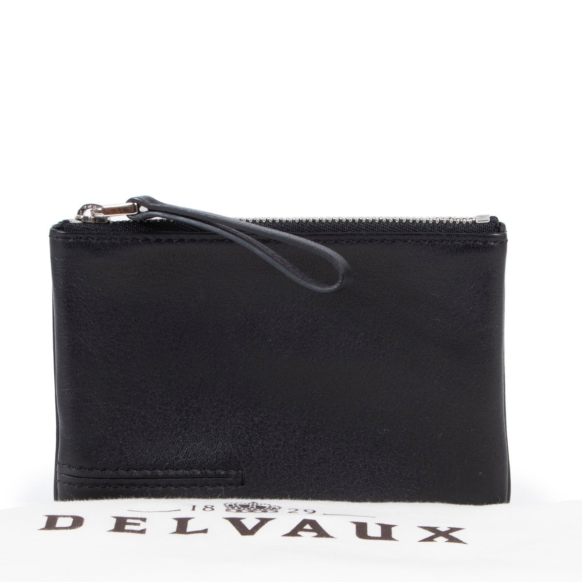 Online kopen authentieke Delvaux portemonee in zwart leer.
