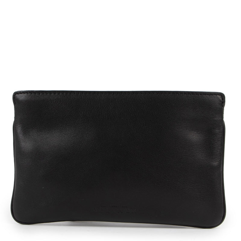 Delvaux Black Pochette Clutch This black Delvaux clutch is for sale now! Buy it here safely