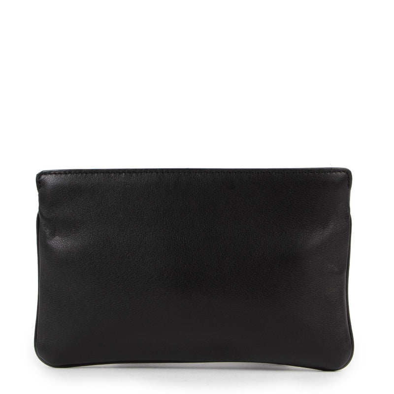 Delvaux Black Pochette Clutch This black Delvaux clutch is for sale now! Buy it here safely