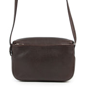 Achetez en ligne l'authentique sac à main Delvaux Macao en cuir brun.