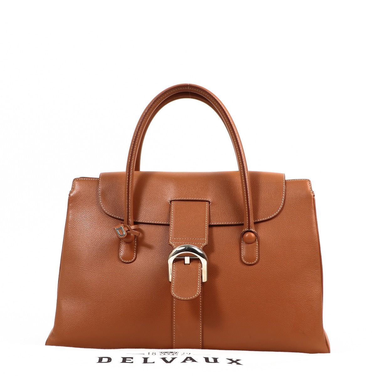 Buy an authentic second-hand Delvaux Cognac Jumping Fauve Cabriolet Top Handle Bag in very good condition at Labellov in Antwerp.