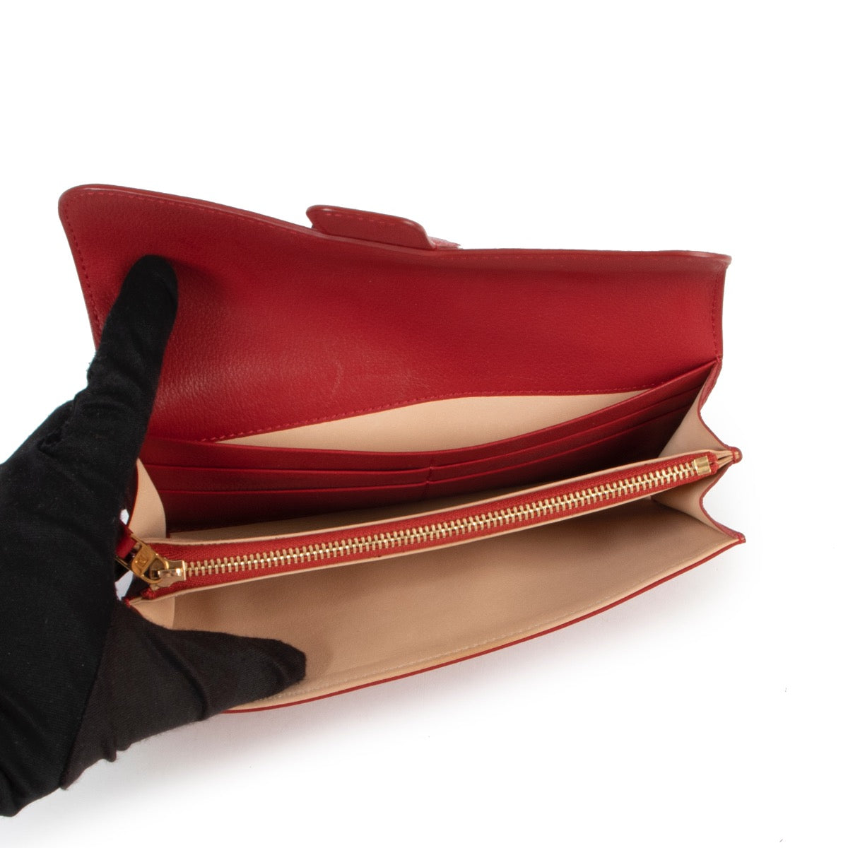 Buy this gorgeous Delvaux Red Escudo Wallet here safely