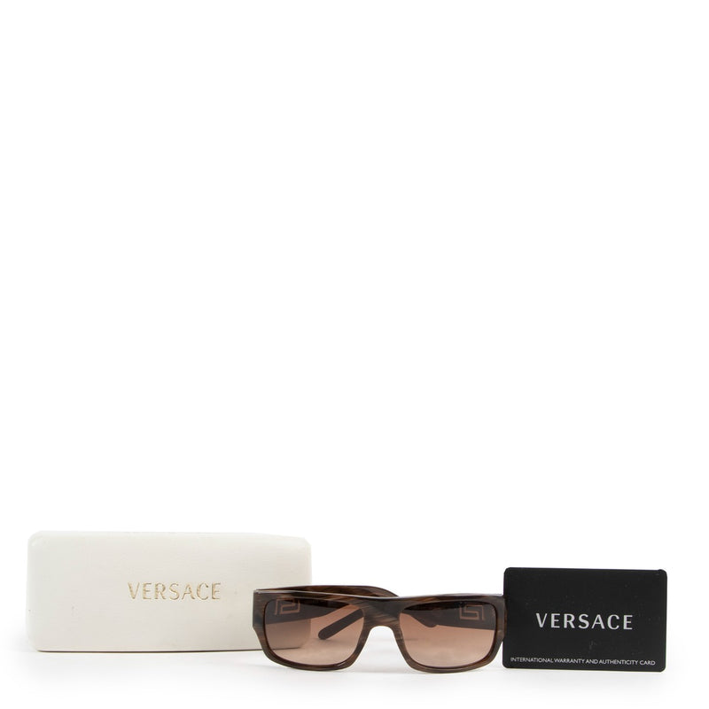 Versace Brown Glasses Buy these gorgeous glasses here safely!