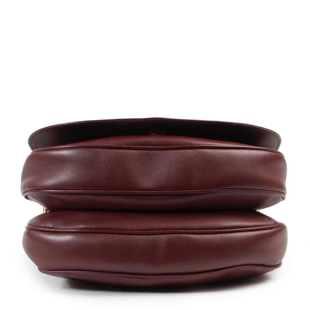 Op een veilige manier online kopen van een Cartier De must crossbody handtas in burgundy leer.