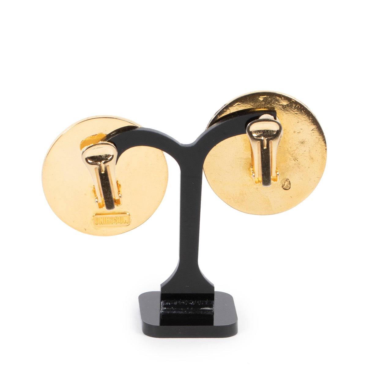 Achat en ligne sécurisé de boucles d'oreilles clip Moschino en plaqué or.