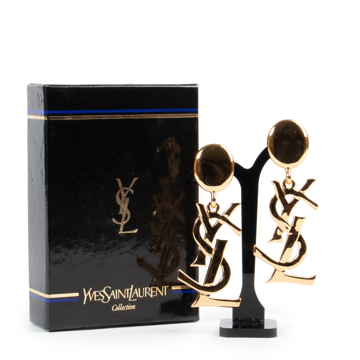 Boucles d'oreilles Yves Saint Laurent pendantes dorées logo YSL