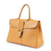 Achetez en ligne ce sac Delvaux Brillant en cuir jaune.