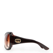 Online kopen van een tweedehands bruine Gucci zonnebril.