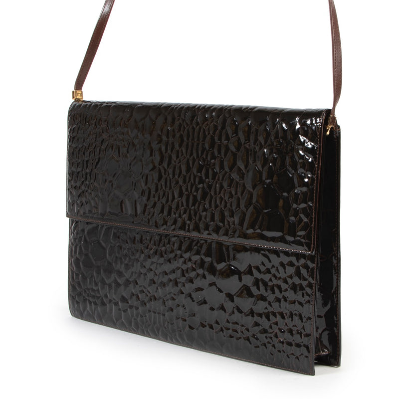 Achetez en ligne seconde main Sergio Rossie brun croco embossed clutch chez Labellov.com.