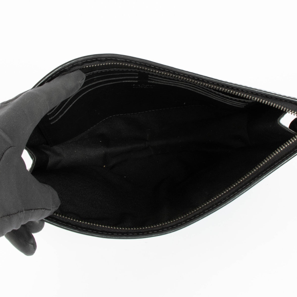 Shop this 100% authentic Louis Vuitton Monogram Eclipse Pochette Voyage Clutch at Labellov.com