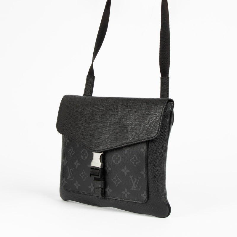 Authentic pre-loved Louis Vuitton Taigrama Outdoor Flap Crossbody Bag on Labellov.com