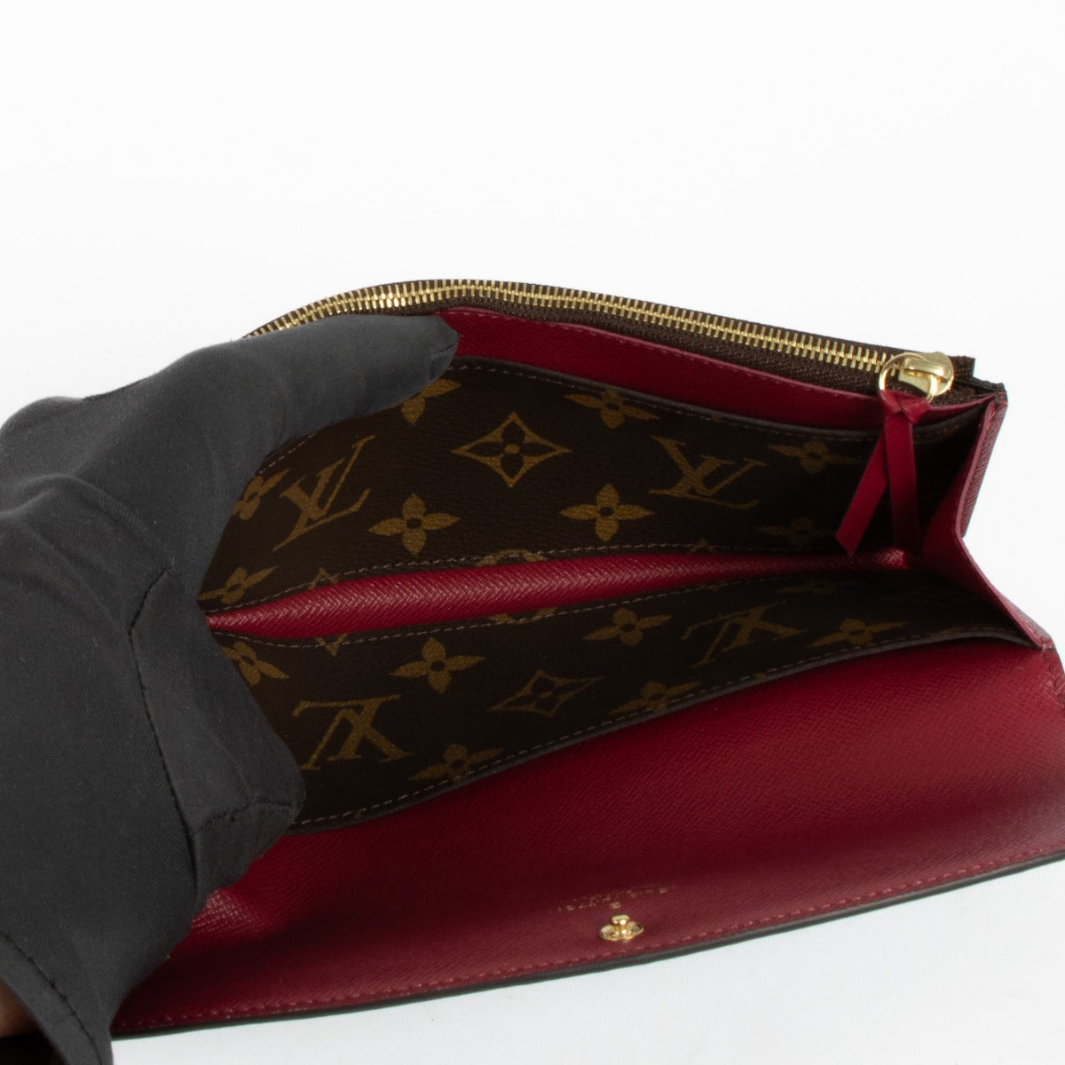 Authentic pre-loved Louis Vuitton Monogram Canvas Emilie Wallet on Labellov.com