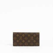Authentic pre-loved Louis Vuitton Monogram Canvas Emilie Wallet on Labellov.com