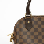 Authentic pre-loved Louis Vuitton Damier Ebene Canvas Alma BB on Labellov.com