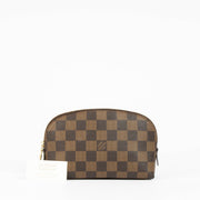 Shop this 100% authentic Louis Vuitton Damier Ebene Cosmetic Pouch PM at Labellov.com