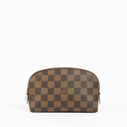 Shop this 100% authentic Louis Vuitton Damier Ebene Cosmetic Pouch PM at Labellov.com