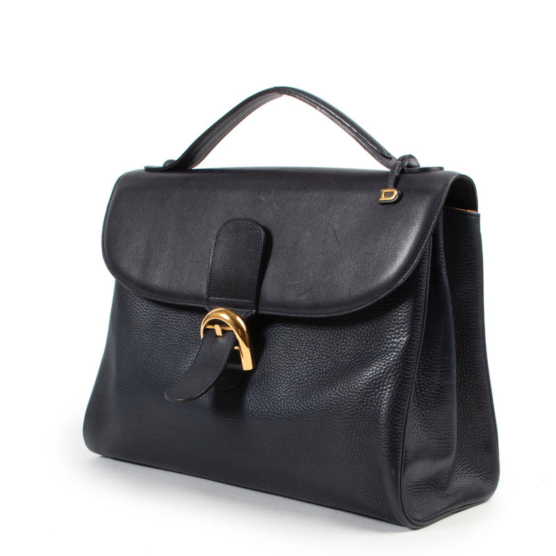 Achetez en ligne en toute sécurité une Delvaux Brillant authentique d'occasion en cuir bleu.