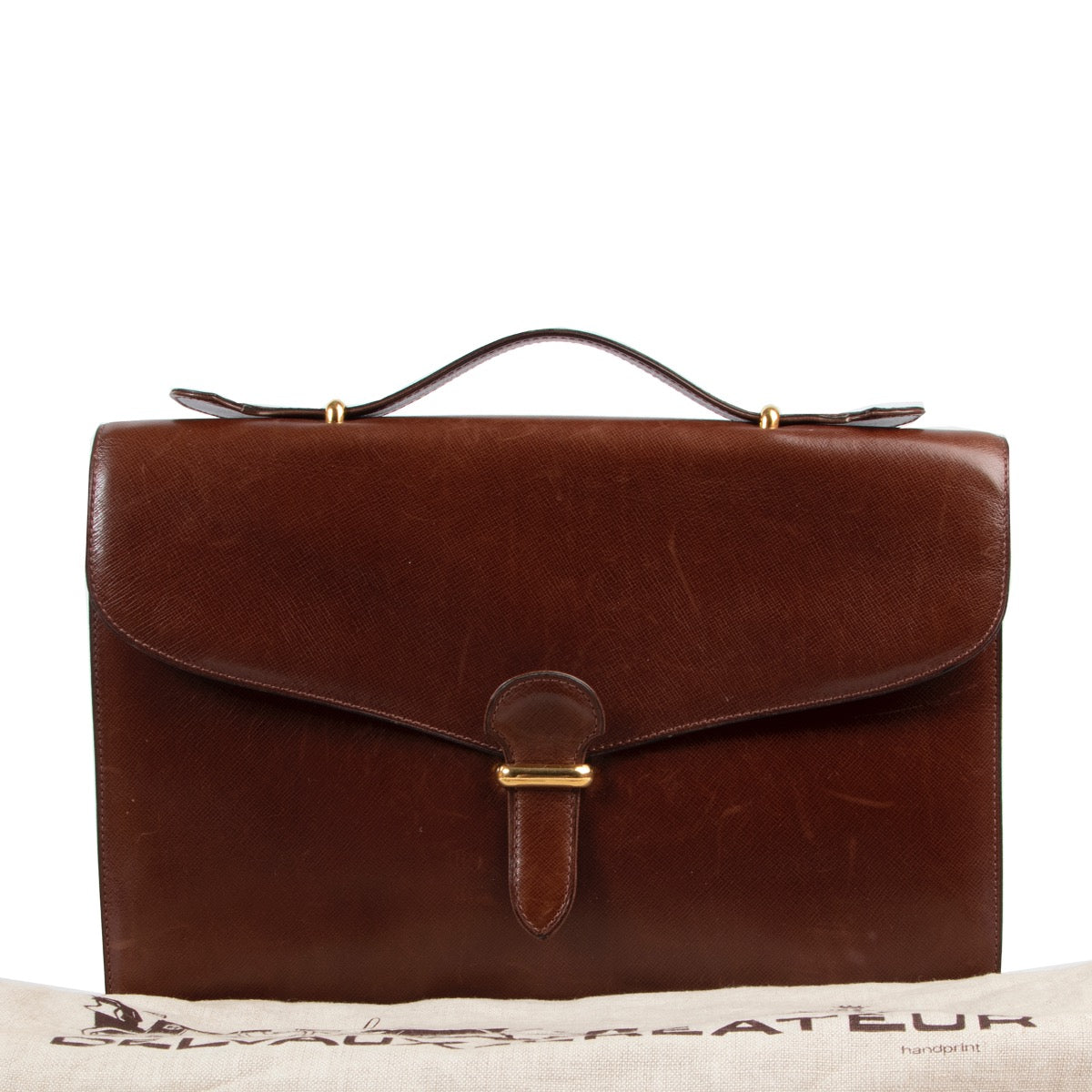 Veilig online kopen van een authentieke tweedehands Delvaux briefcase top handle handtas.