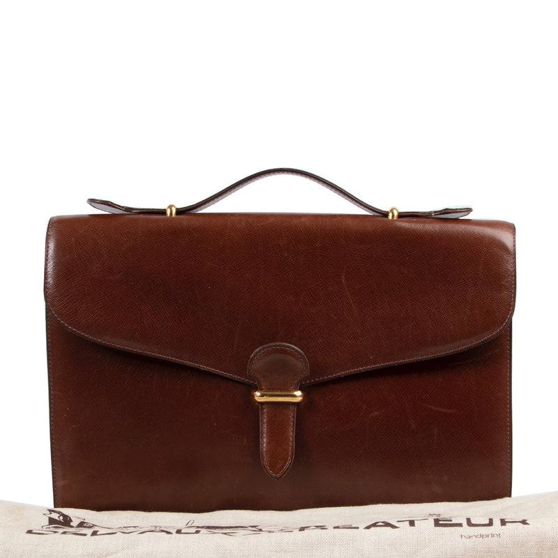 Veilig online kopen van een authentieke tweedehands Delvaux briefcase top handle handtas.