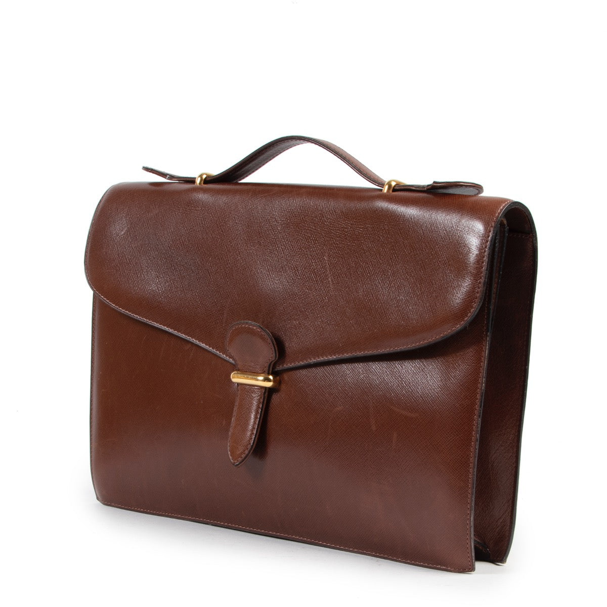 Achetez en ligne second main ce sac Delvaux en cuir brune.
