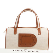 Shop safe online 100% authentic second hand Delvaux Beige Canvas Astrid Boston Bag at the right price at Labellov in Antwerp.