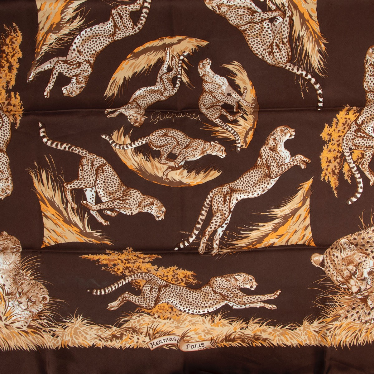 Shop safe online 100% authentic second hand Hermès Brown Guépards Silk Scarf at Labellov in Antwerp.
