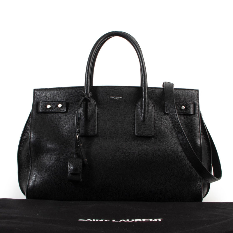 Achetez en ligne second main ce sac Saint Laurent noir Sac de Jour chez Labellov.com.