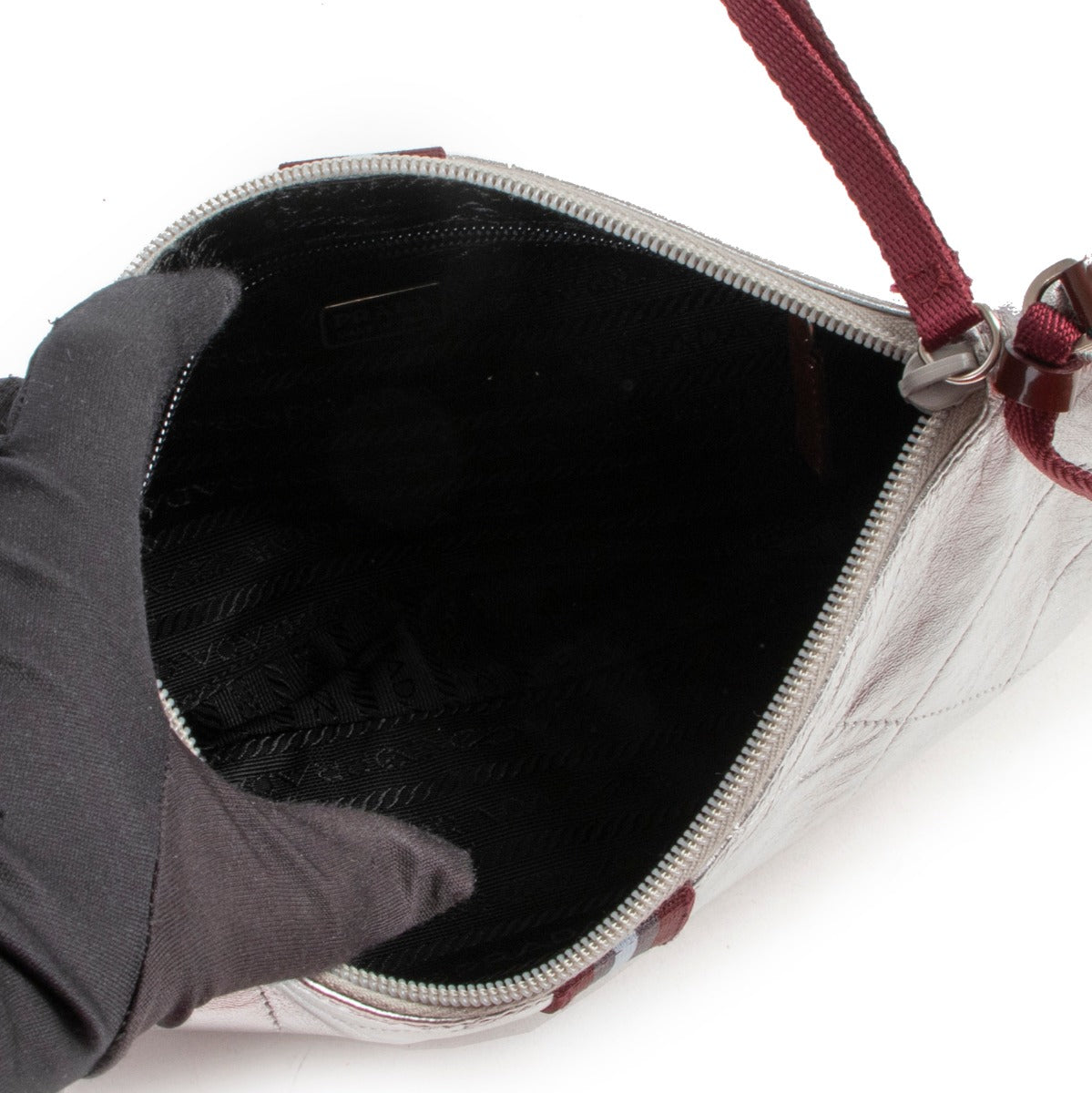 Buy and sell your authentic designer items at Labellov in store or online such as this Prada Shoulder Nappa Matelasse Bag Argento.
