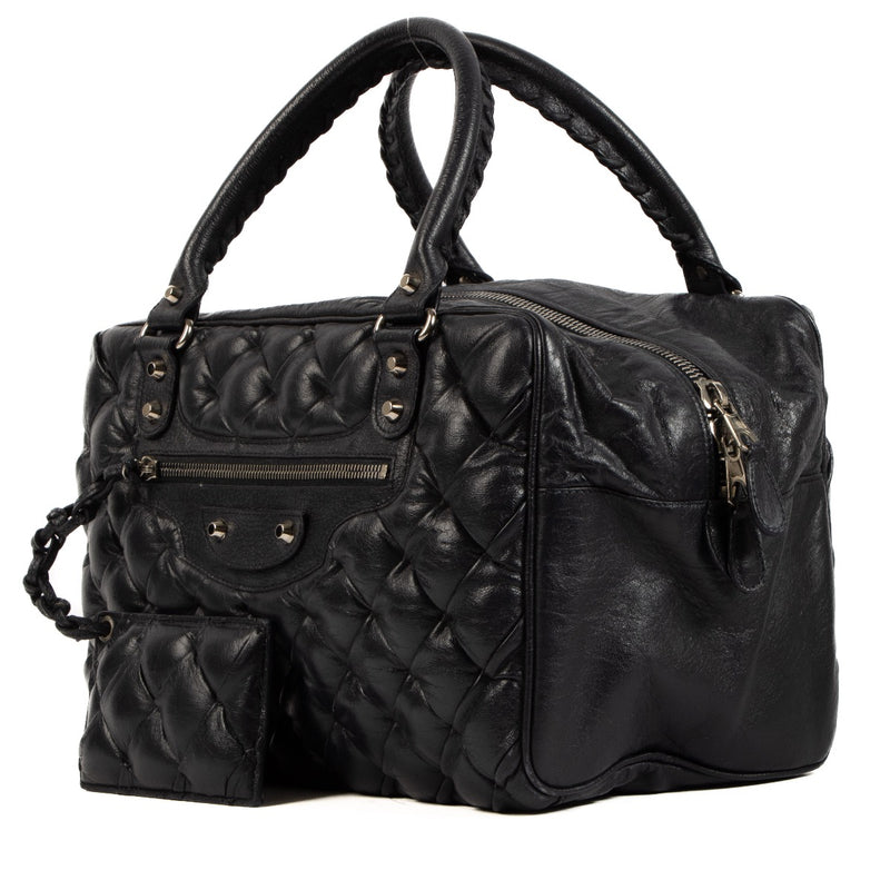 Buy and sell authentic vintage second hand Balenciaga Black Leather Quilted Plombe Handbag at Labellov for the best price.