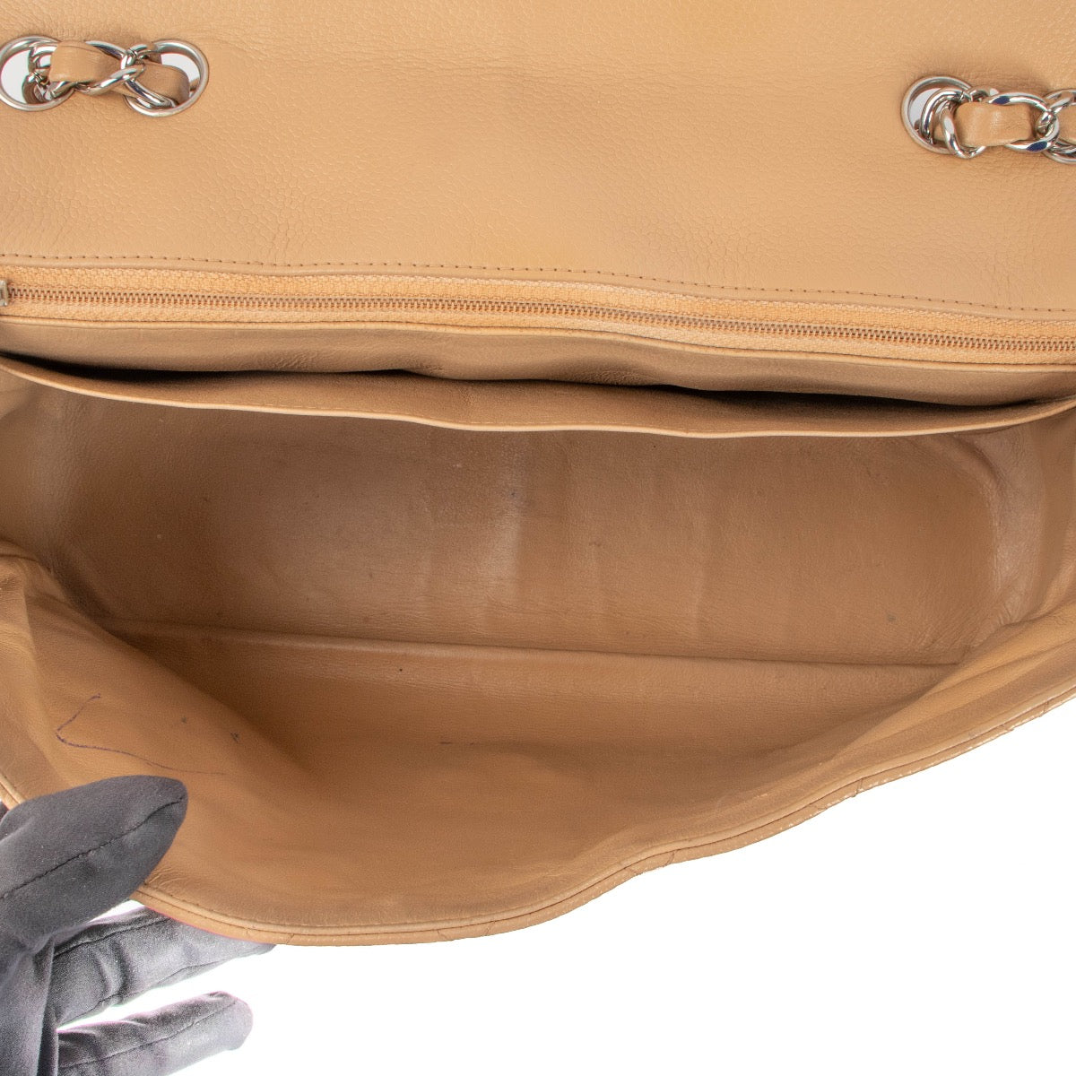 Shop this authentic second hand Chanel Beige Caviar Leather Large Classic Flap Bag on Labellov.com