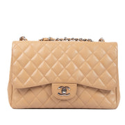 Shop this authentic second hand Chanel Beige Caviar Leather Large Classic Flap Bag on Labellov.com