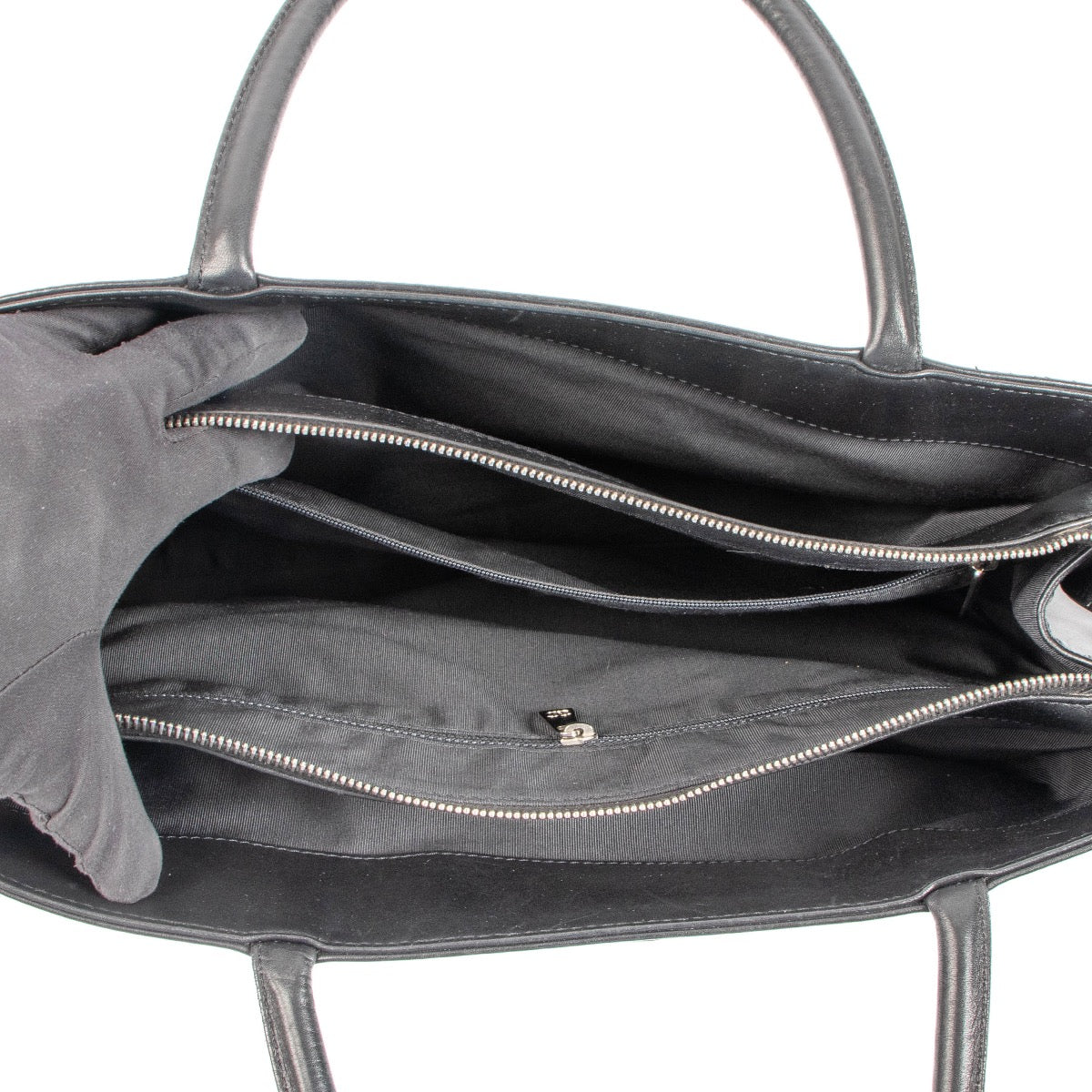 Shop this authentic second hand Chanel Black Guilted Leather Tote Bag on Labellov.com