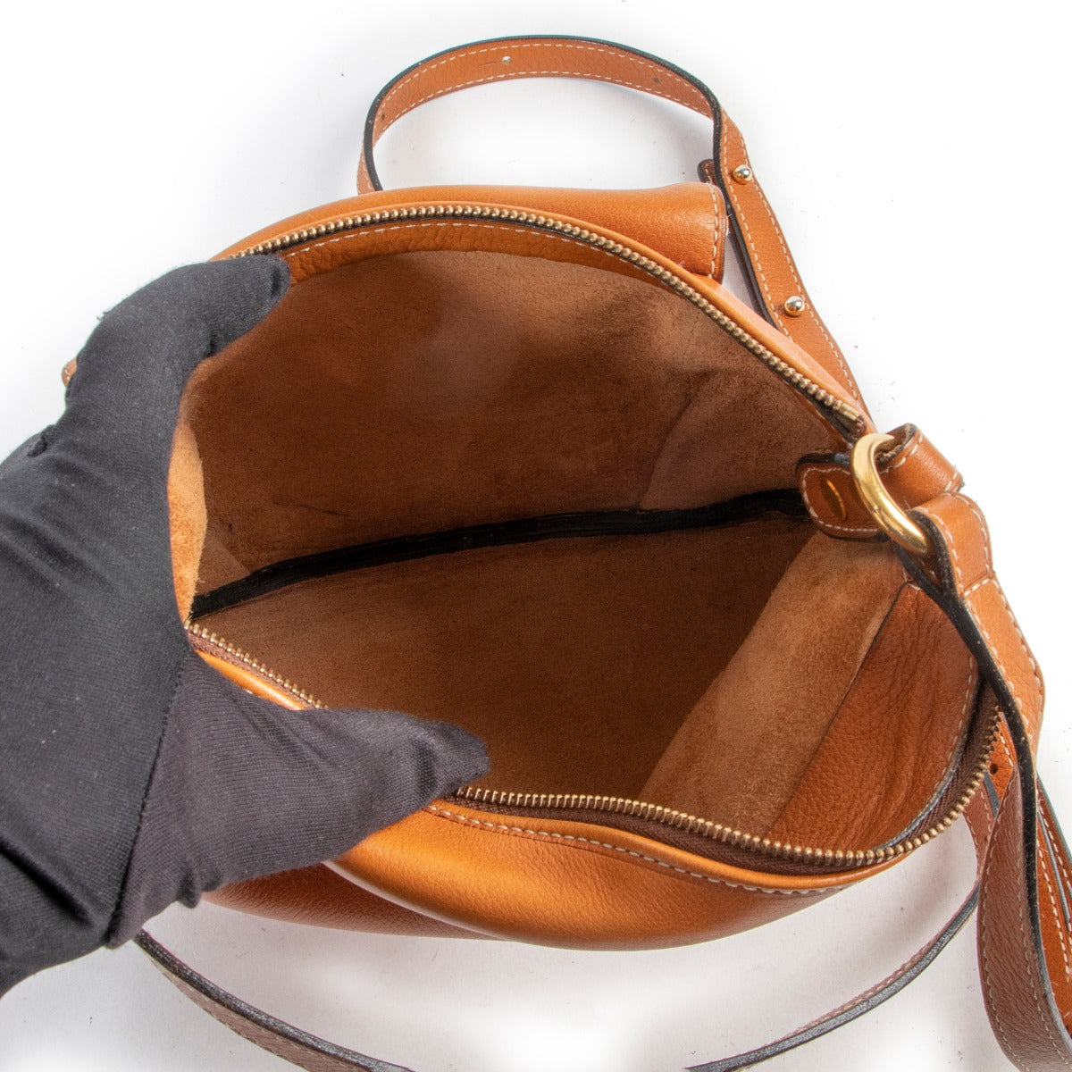 Shop this vintage catch, Delvaux Cognac Shoulder Bag, at Labellov in store or online.