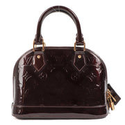 Louis Vuitton Vernis Monogram Alma Amarante PM for the best price at Labellov secondhand luxury in Antwerp