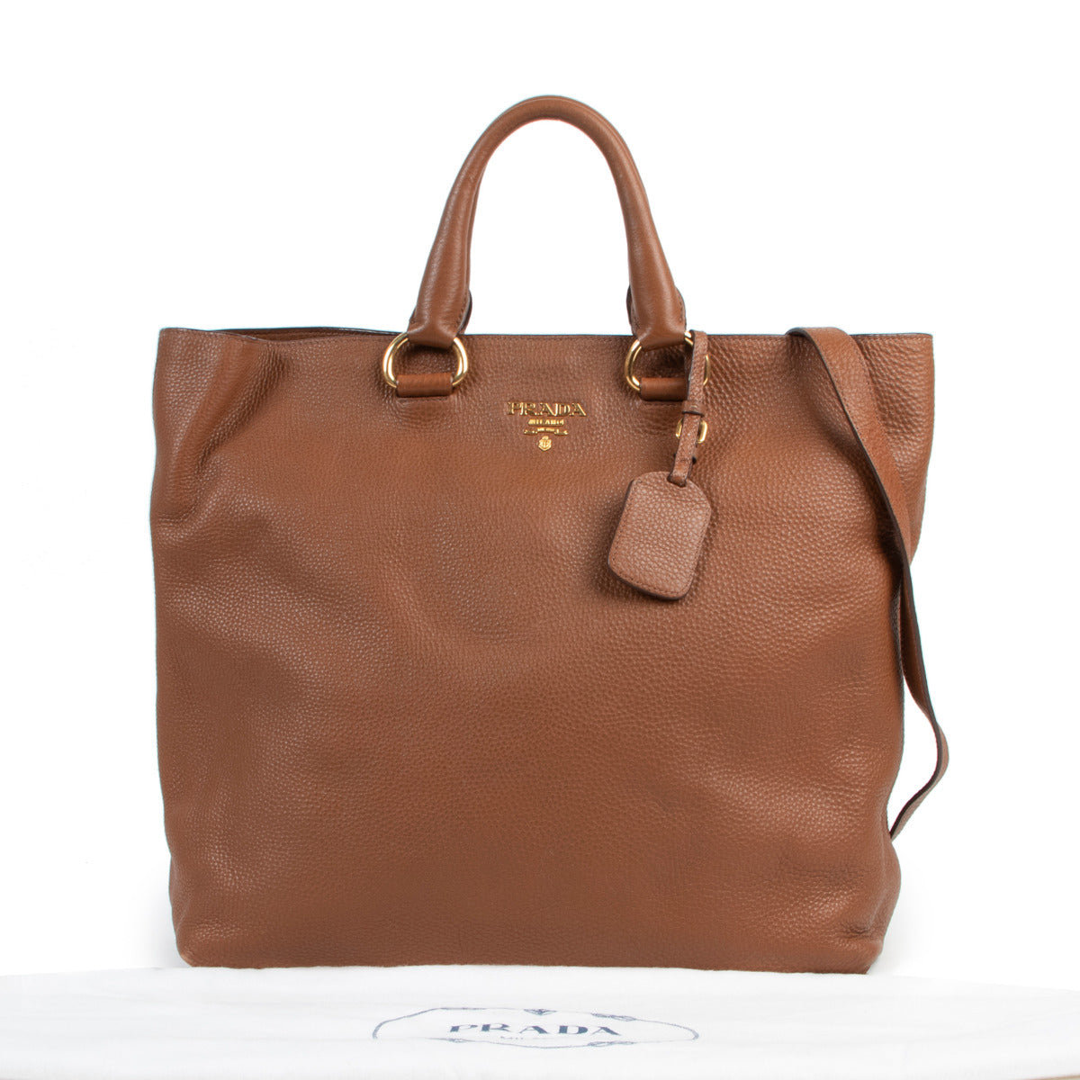 Prada cognac pebbled leather shoulder bag for the best price at Labellov secondhand luxury in Antwerp