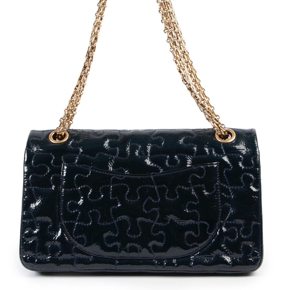 Shop safe online at Labellov in Antwerp this 100% authentic second hand Chanel Blue Patent Reissue 2.55 Puzzle Bag