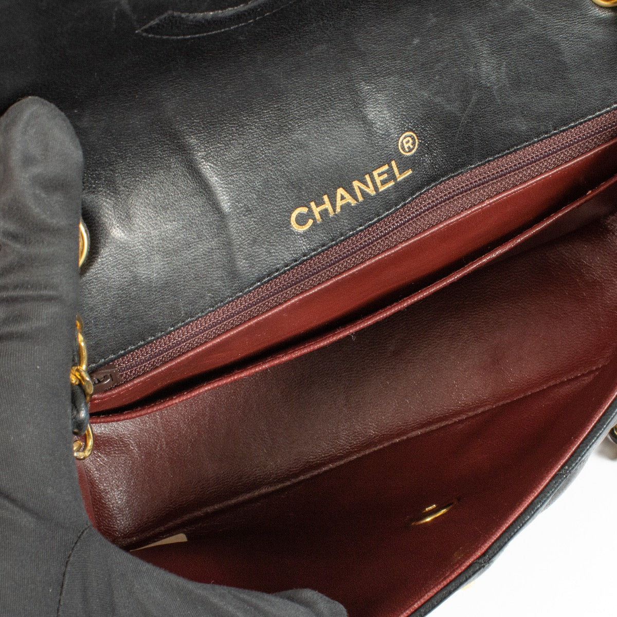 shop 100% authentic second hand Chanel Black Classic Flap Bag on Labellov.com