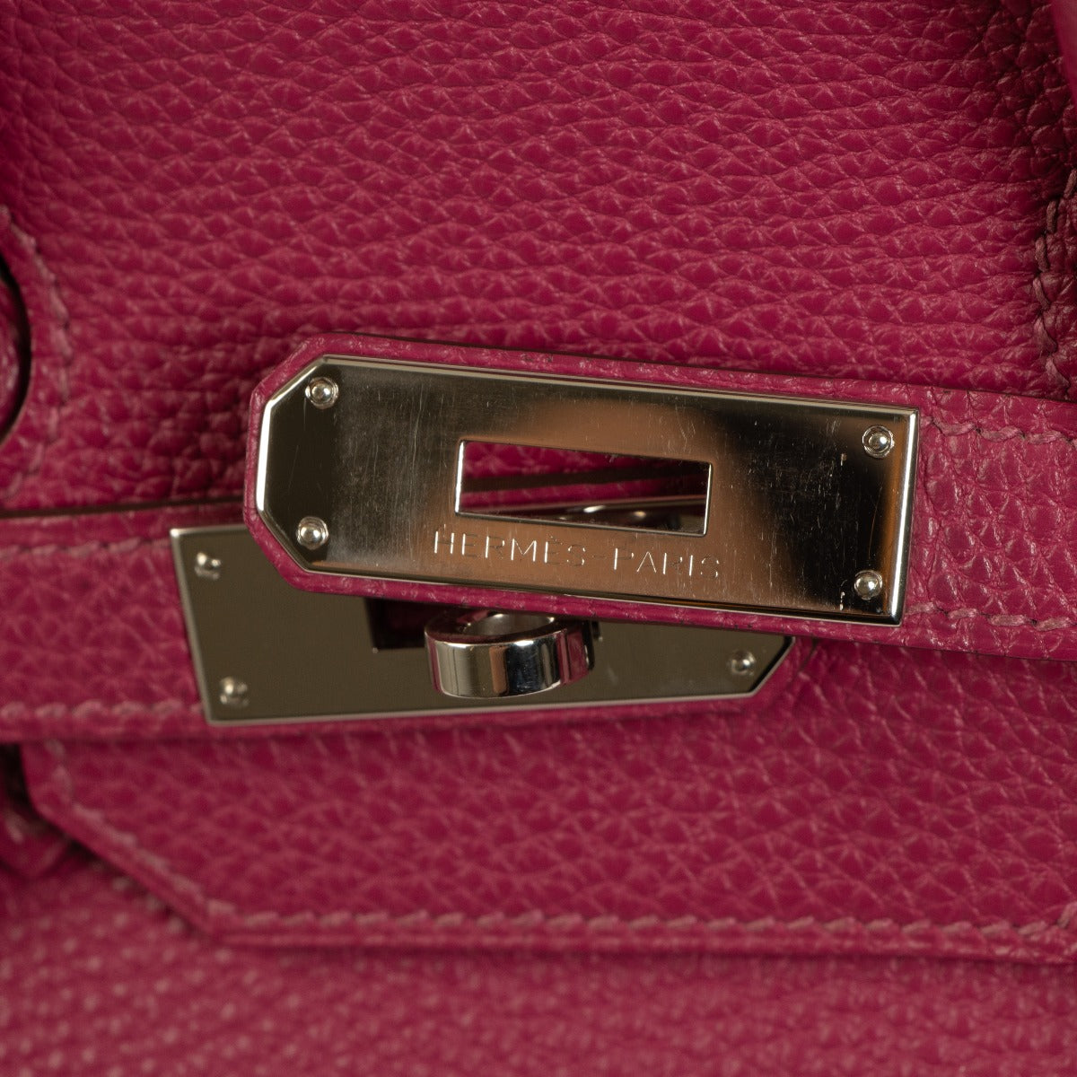 hermes plate logo engraving detail closeup