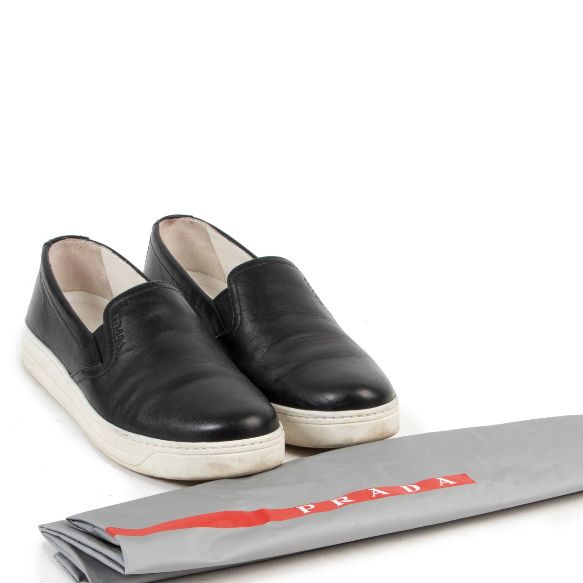Shop Prada Sport Black Leather Slip On Sneakers online in a safe way.