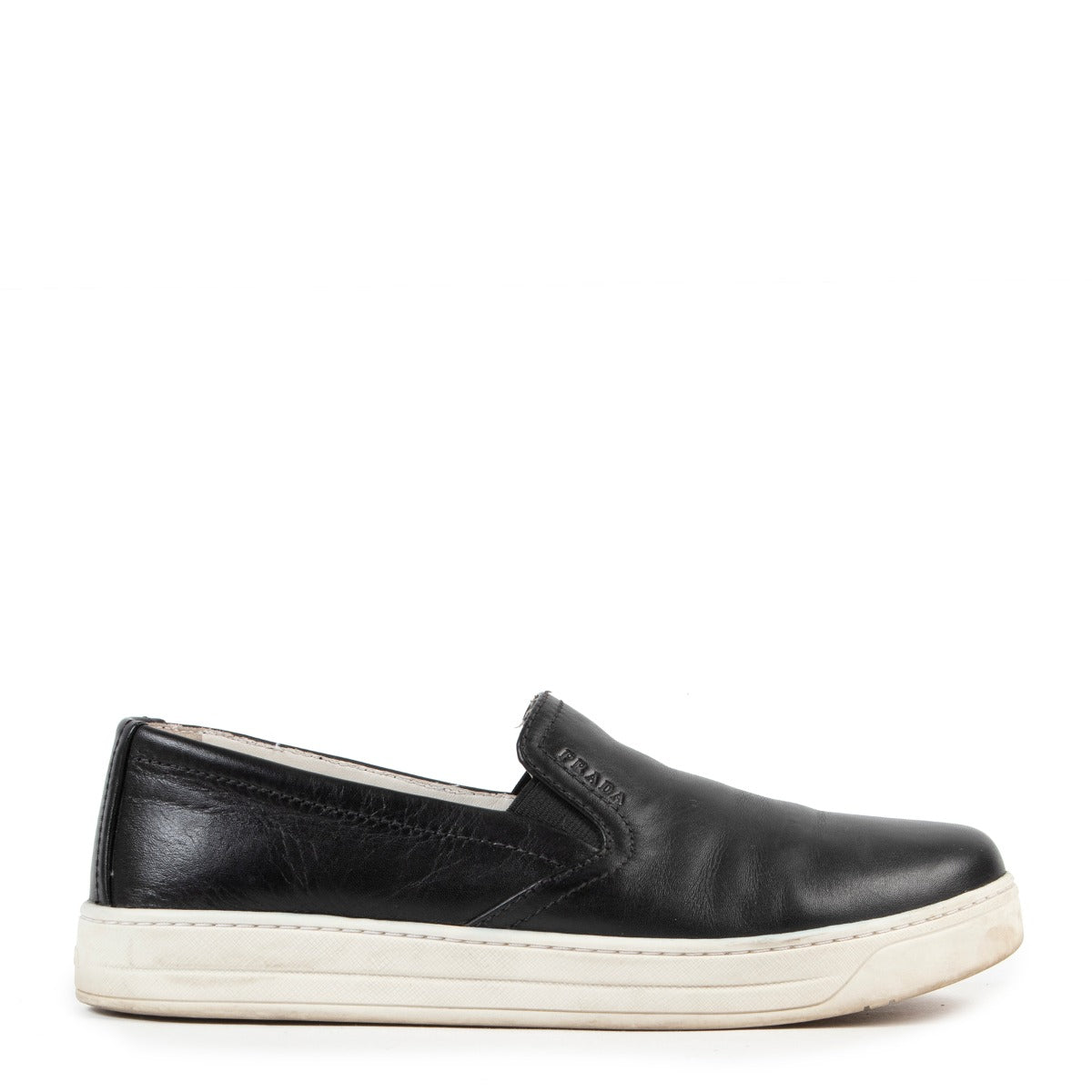Buy Prada Sport Black Leather Slip On Sneakers online in a safe way for the right price.