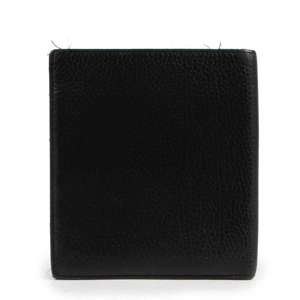 Achetez en ligne second main ce portefeuille Delvaux en cuir noir.