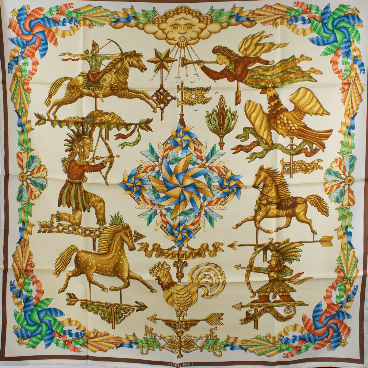 Shop safe online at Labellov in Antwerp, Brussels and Knokke this 100% authentic second hand Hermès Multicolor Les Girouettes Silk Carré 90 Scarf