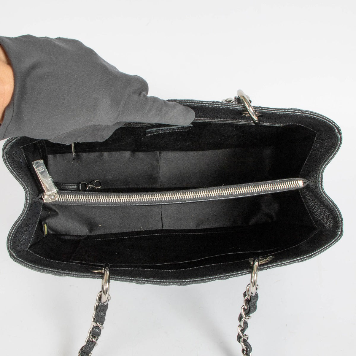 Authentic pre-loved Chanel Black Caviar GST Grand Shopping Tote Bag on Labellov.com