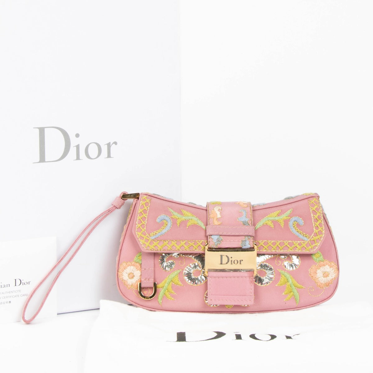 Shop this 100% authentic Christian Dior Pink Embroidered Limited Edition Columbus Clutch at Labellov.com