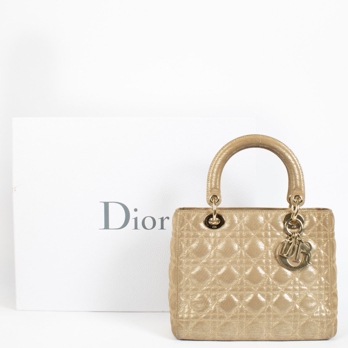 authentic preloved Christian Dior Gold Fabric Medium Lady Dior Short on Labellov.com