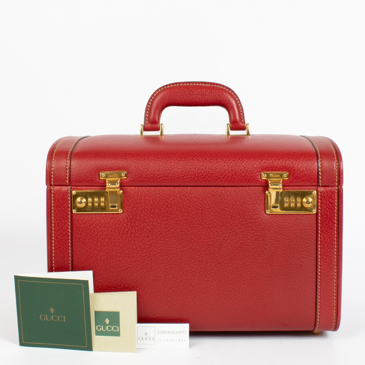 Gucci vintage red leather beauty case with gold locks and mirror interior at Labellov.com