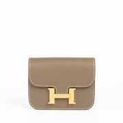 Shop this 100% authentic Hermès Constance Slim Wallet Etoupe Epsom GHW at Labellov.com